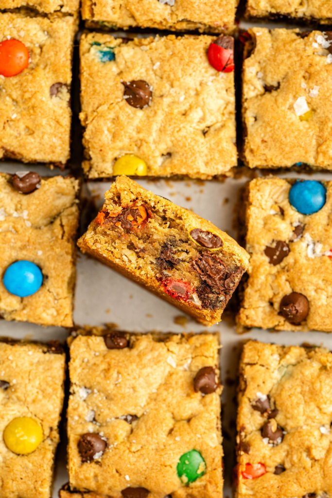 an up close view of monster cookie bars ready to serve.
