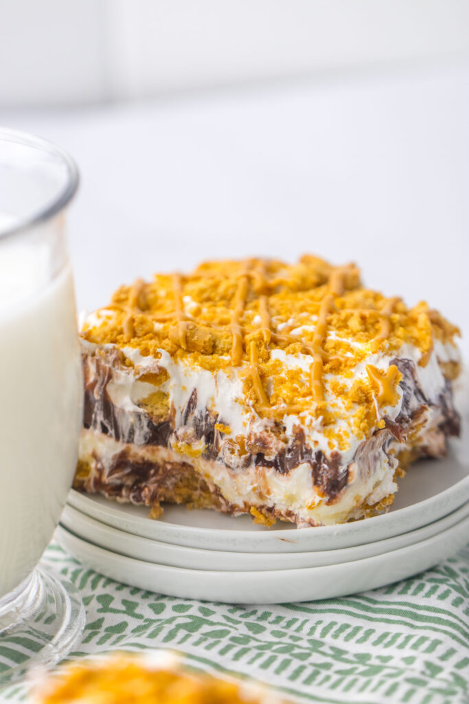 a slice of nutter butter lasagna on a serving plate.
