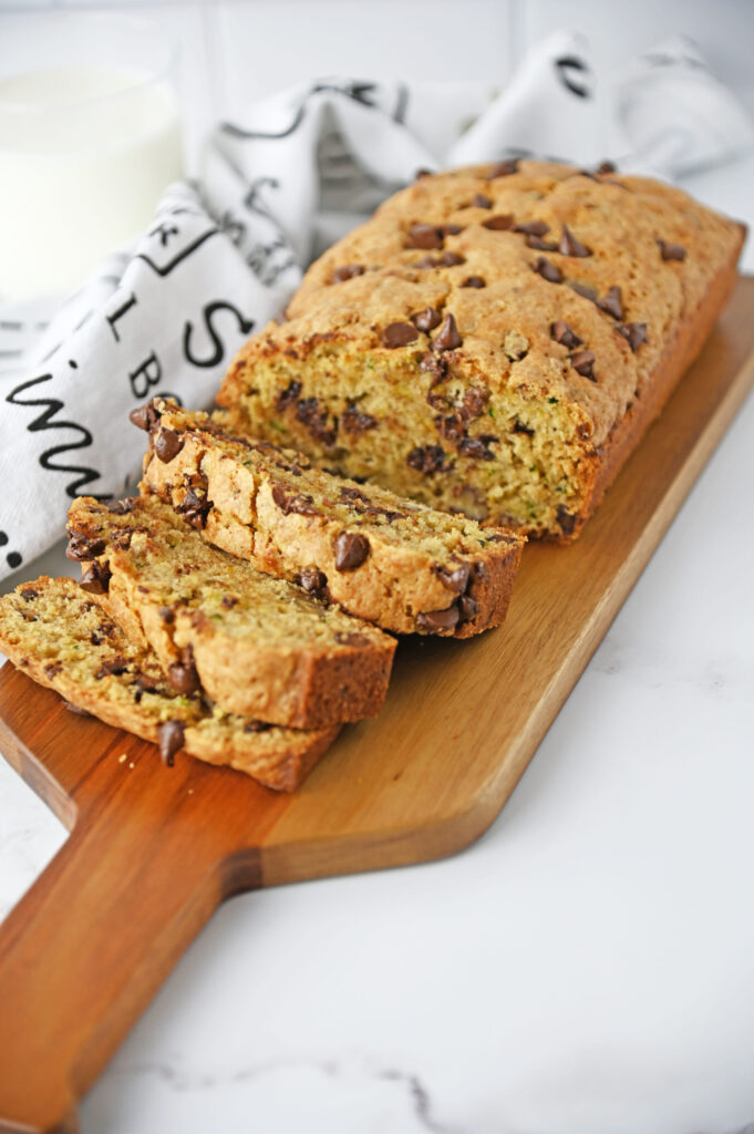 chocolate chips studded throughout a fresh loaf of bread.