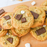 baked cookies on a wood cutting board ready to serve.