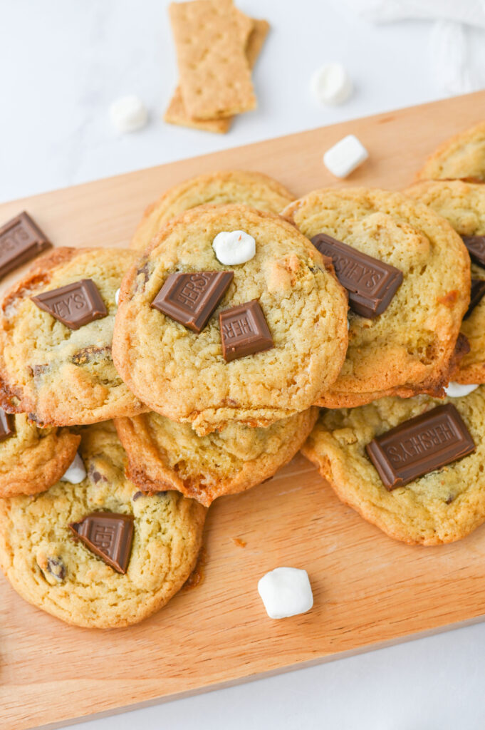 baked cookies on a wood cutting board ready to serve.