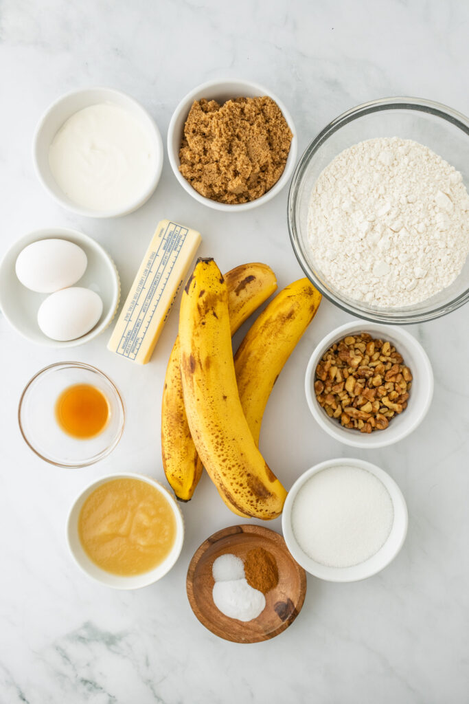 all the ingredients needed to make banana bread bars with cream cheese frosting.