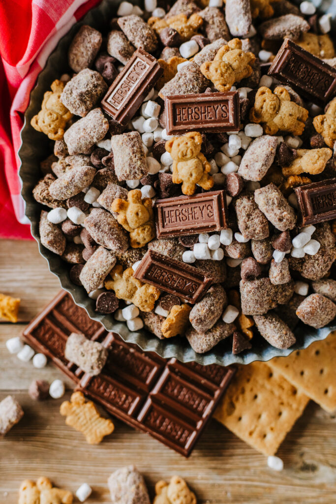 marshmallows, chocolate, and graham crackers combined with coated chex cereal.