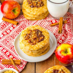 a plate of soft apple cookies with milk.