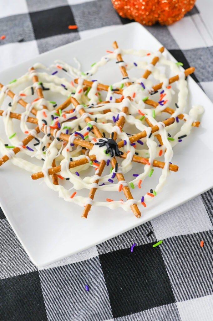 spooky Halloween treats made with chocolate and pretzels.