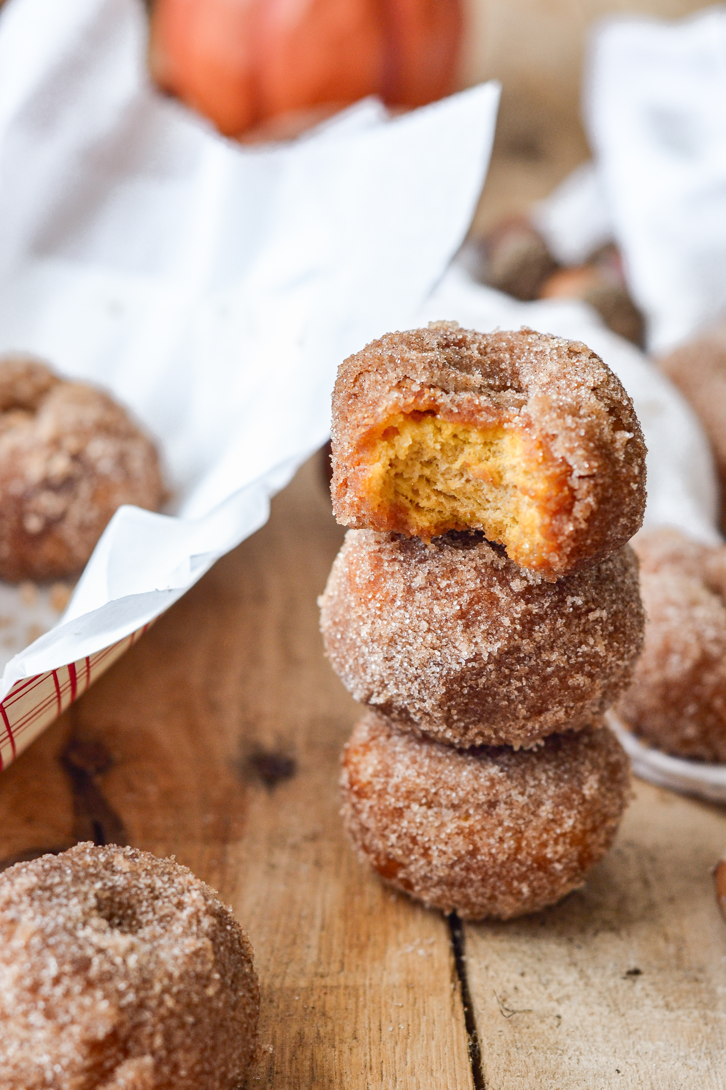 a stack of Fall flavored donuts that have been fried.
