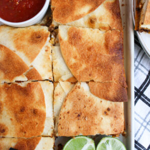 sheet pan quesadillas baked in a sheet pan and ready to serve.