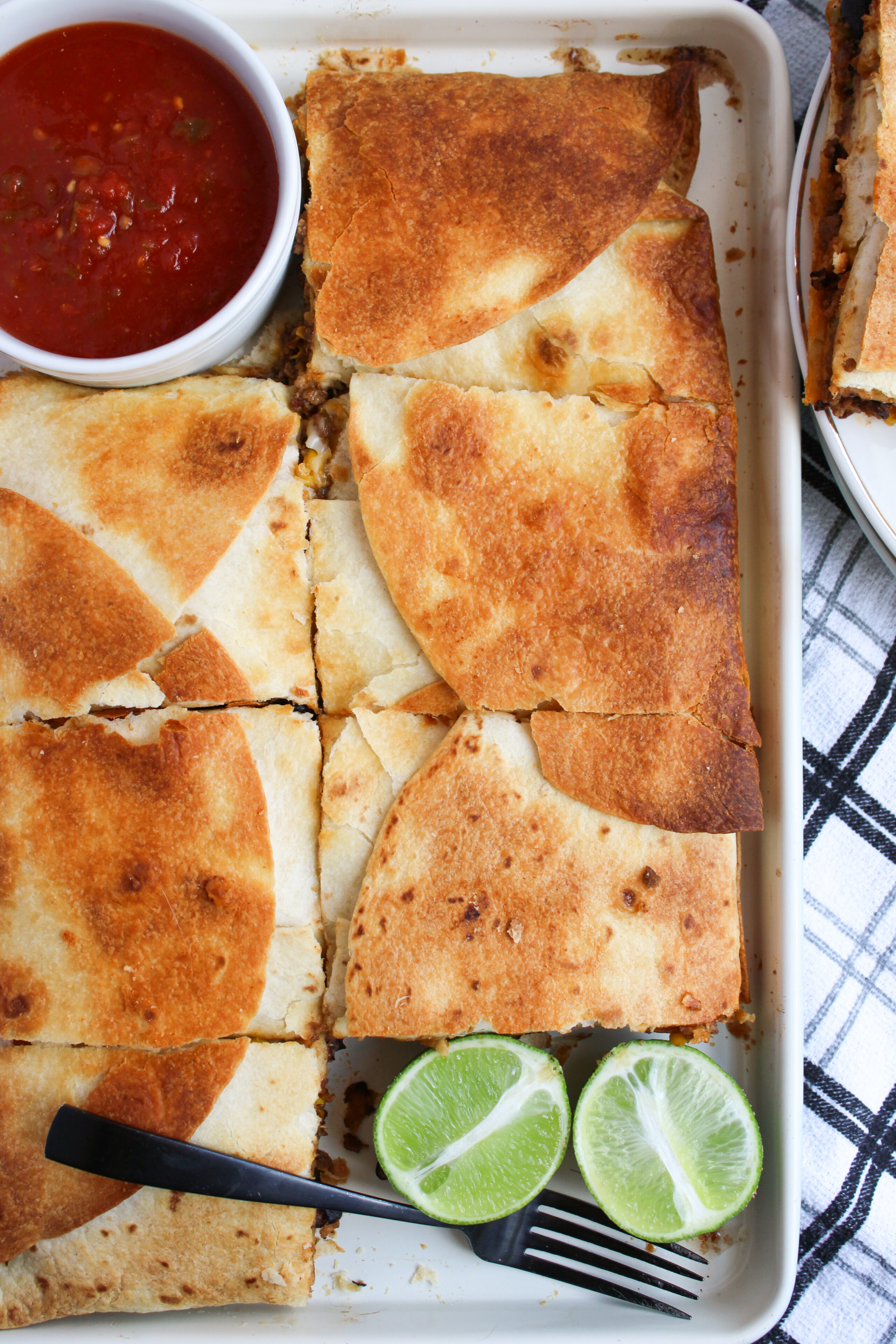 sheet pan ground beef quesadillas ready to serve.