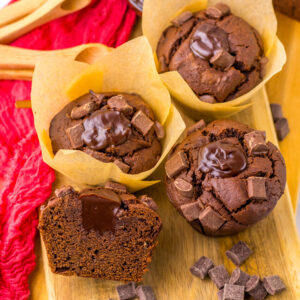 olympic village chocolate muffins on a board ready to serve.