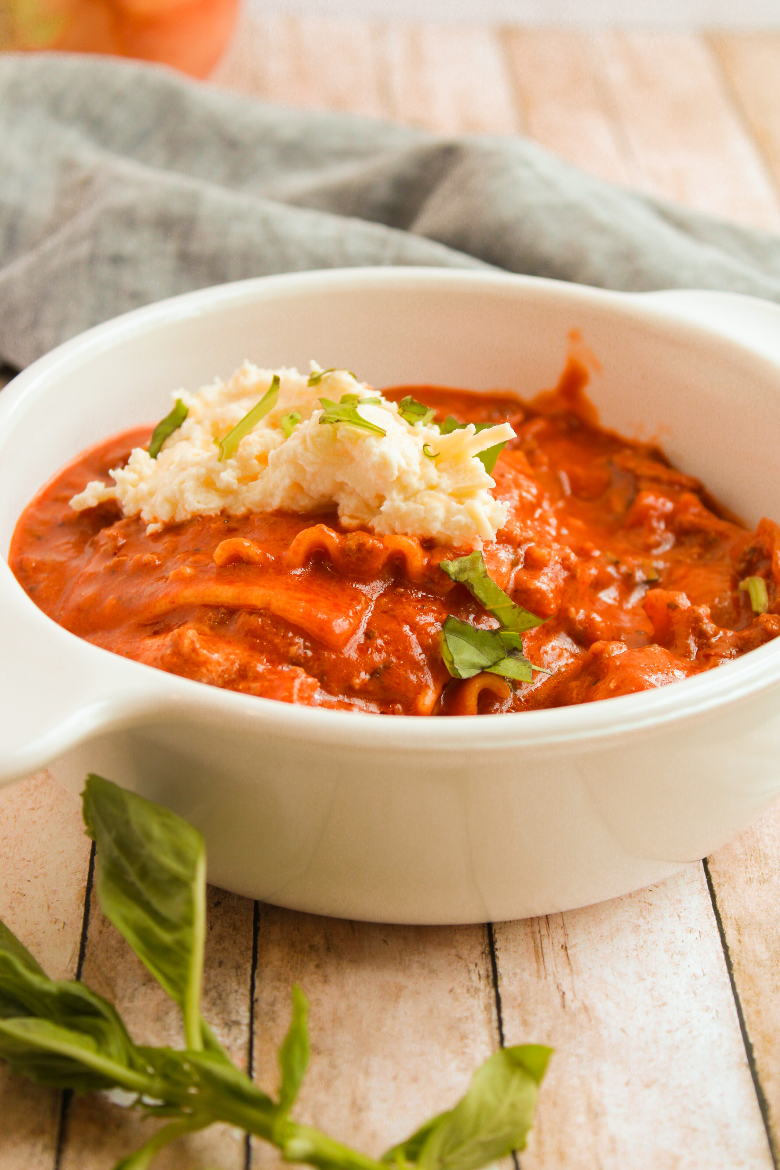 lasagna soup in a white soup bowl.