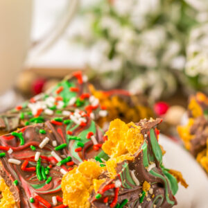 a white plate full of Christmas Cornflake pieces.