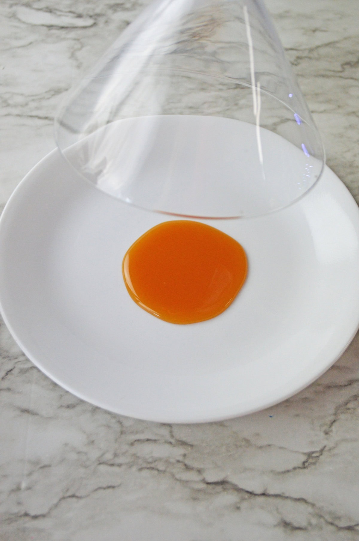 caramel syrup on a saucer to rim a  cocktail glass with.