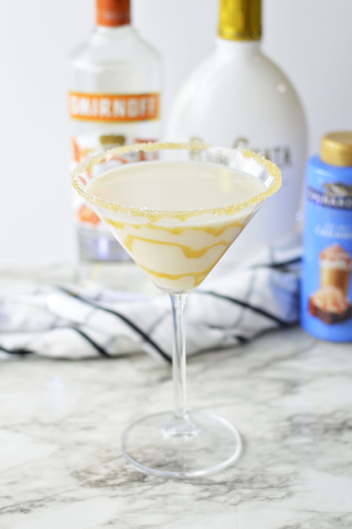 a creamy salted caramel martini ready to enjoy.