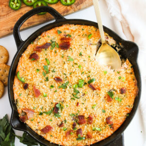 a creamy, cheesy dip made with peppers, cheeses, and bacon.