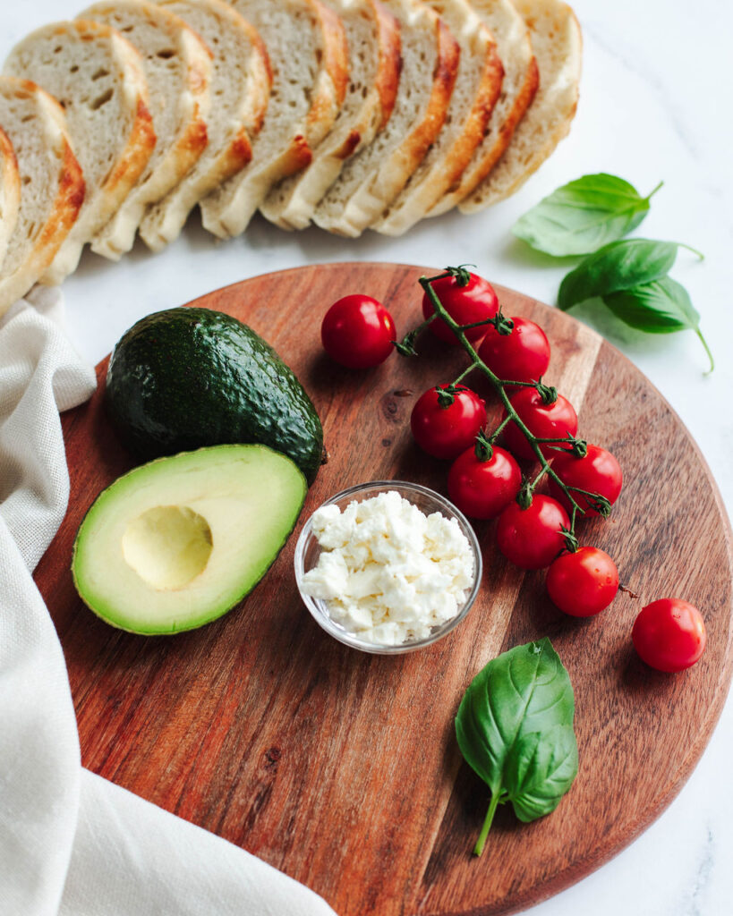 all the ingredients needed to make Avocado Toast with Tomato.