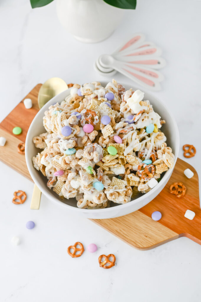 a white bowl with Easter Bunny Bait snack mix.