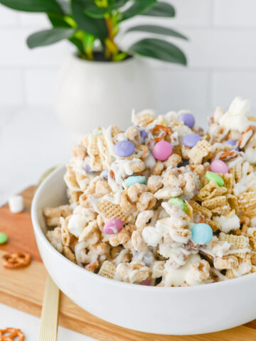 a salty sweet cereal mixture in a white bowl.