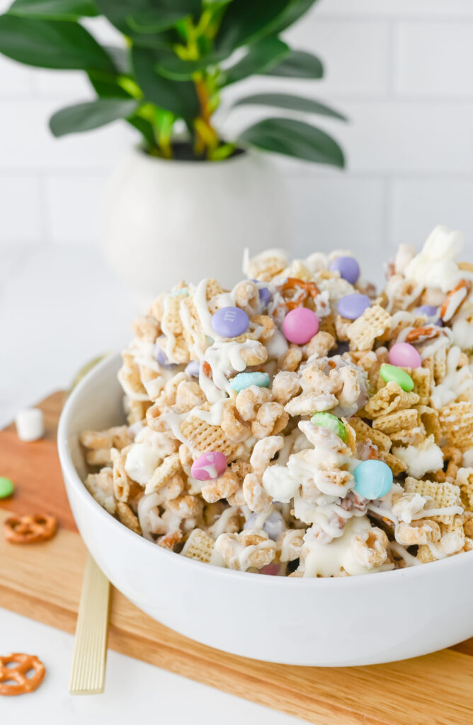 a salty sweet cereal mixture in a white bowl.