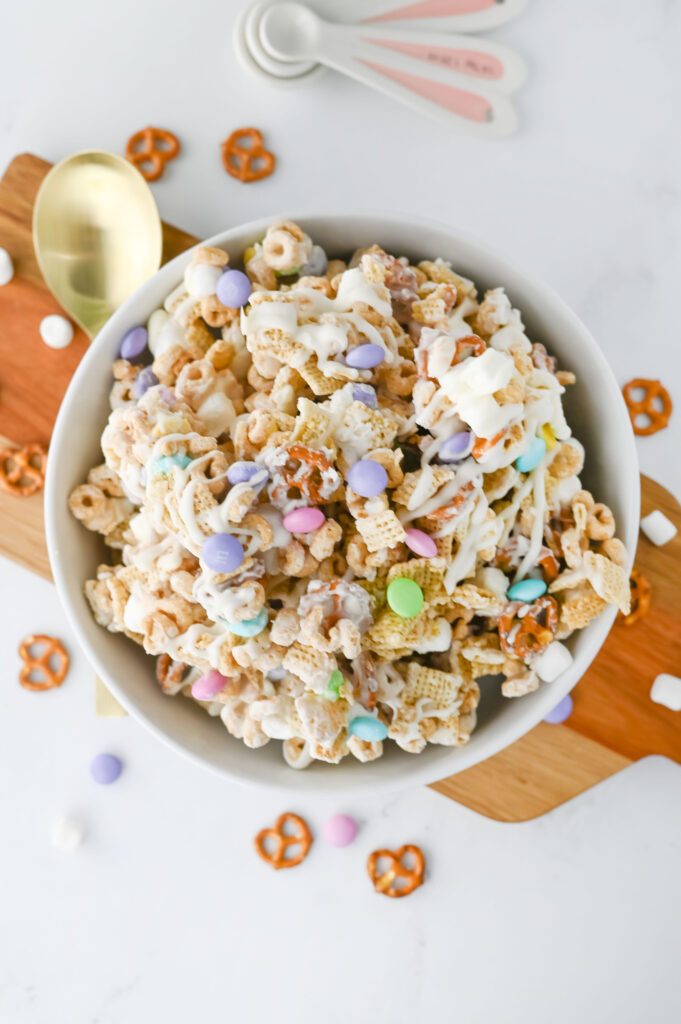 a white bowl with chex snack mix for Easter.