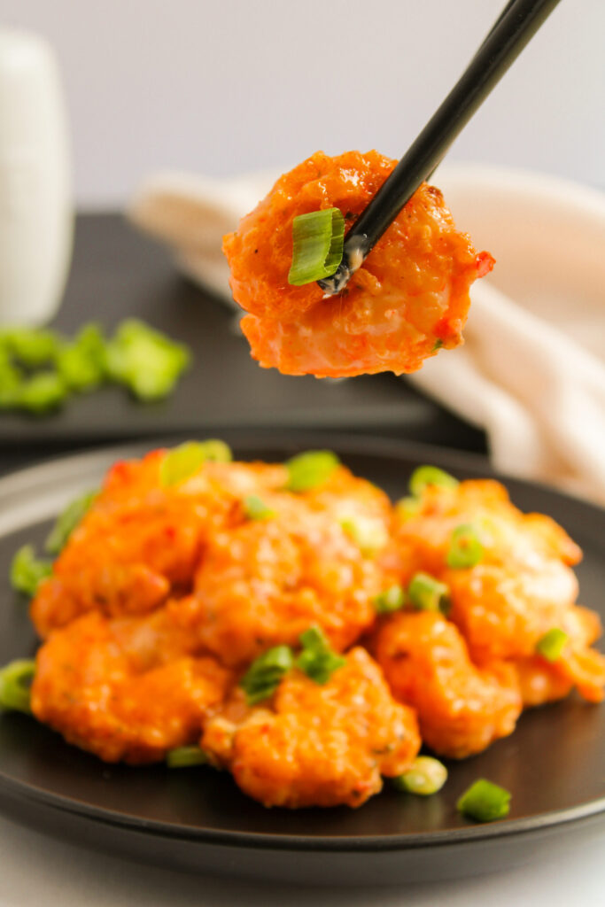 a crispy shrimp ready to eat.