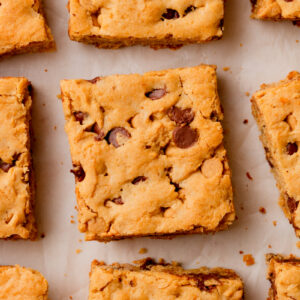 sliced bars on a sheet of parchment paper.