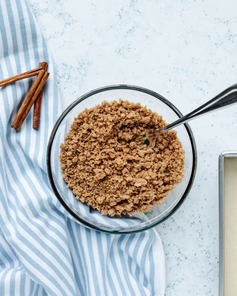 a brown sugar streusel made in a glass mixing bowl.