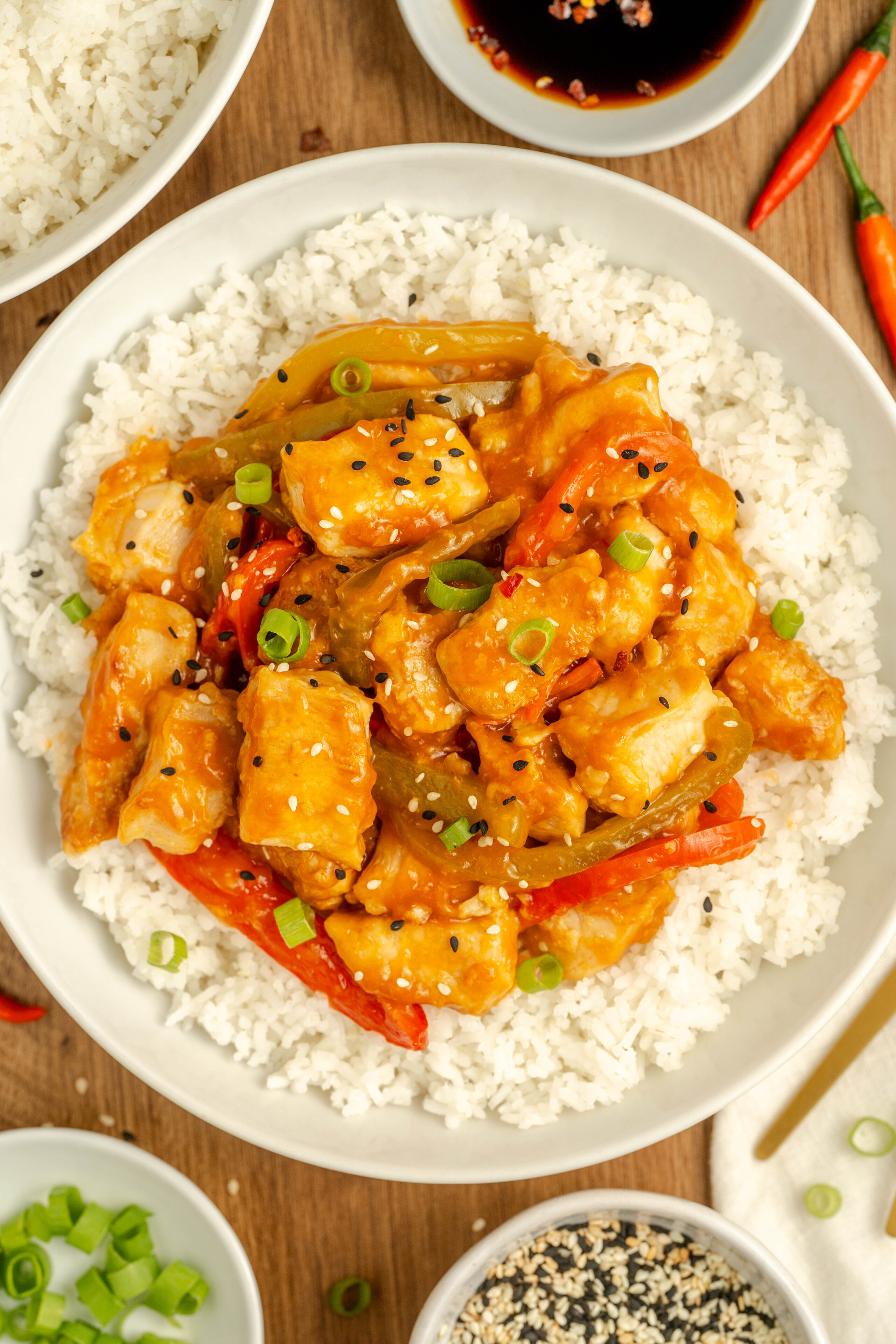 Angry Chicken in a bowl with white rice.