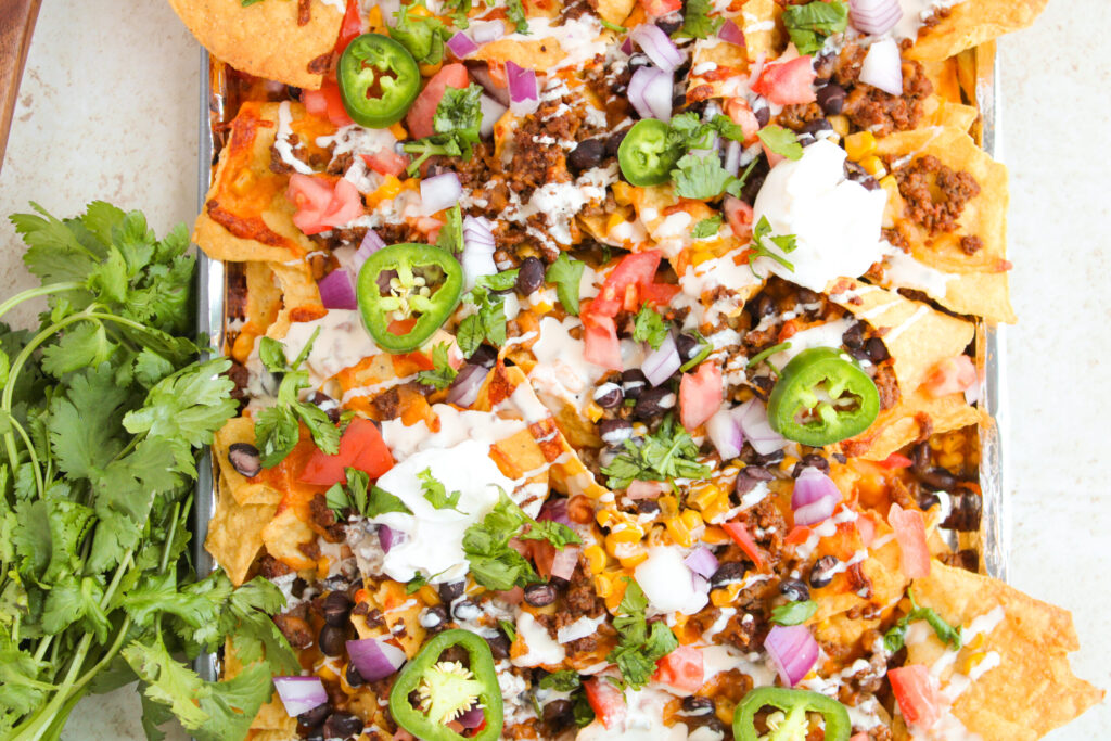 a tasty loaded appetizer, snack, or meal option on a sheet pan.