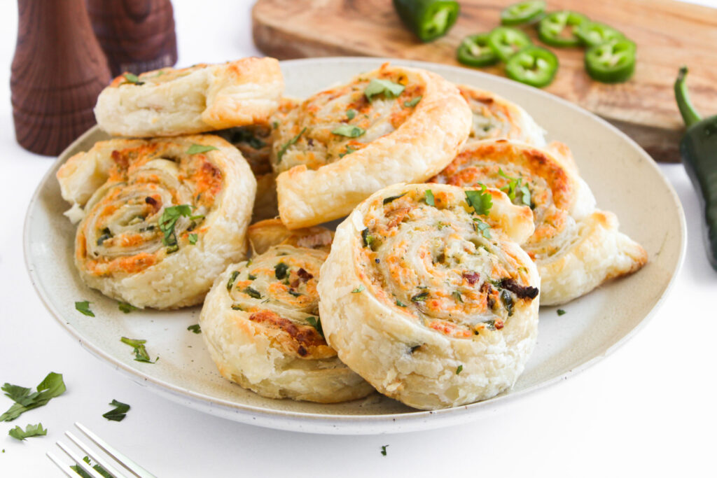 a creamy cheese mixture inside of puff pastry for an appetizer or snack.