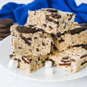 a stack of Oreo Rice Krispie Treats on a white plate.