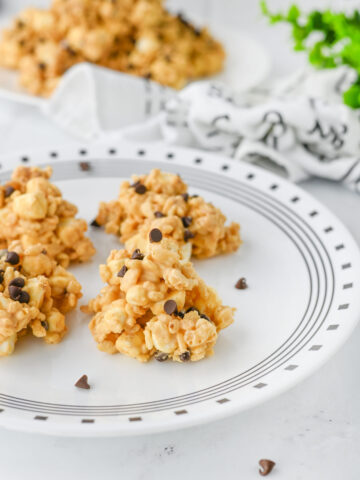 Avalanche Cookies on a white and black plate.