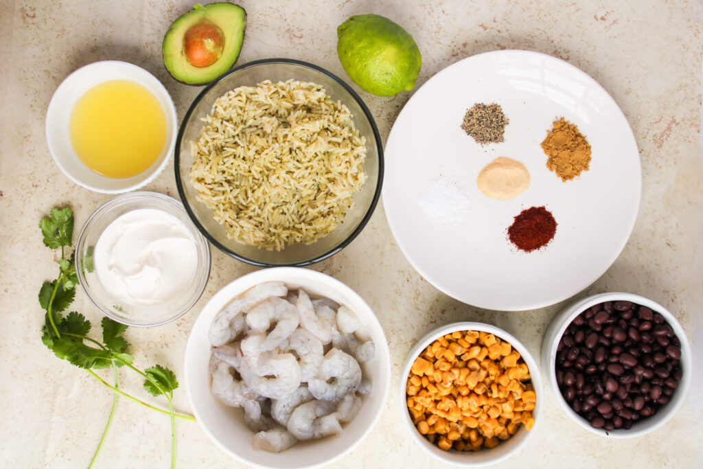 all the ingredients needed to make Shrimp Burrito Bowls.