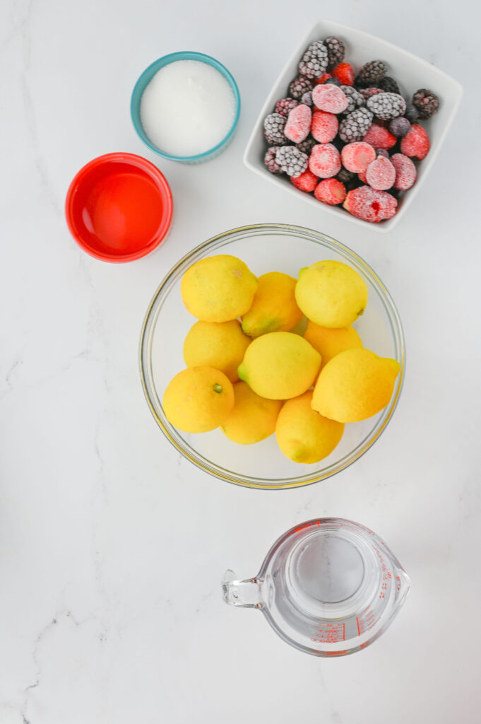 all the ingredients needed to make Berry Lemonade.