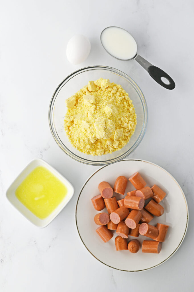 all the ingredients needed to make Mini Corn Dog Muffins.