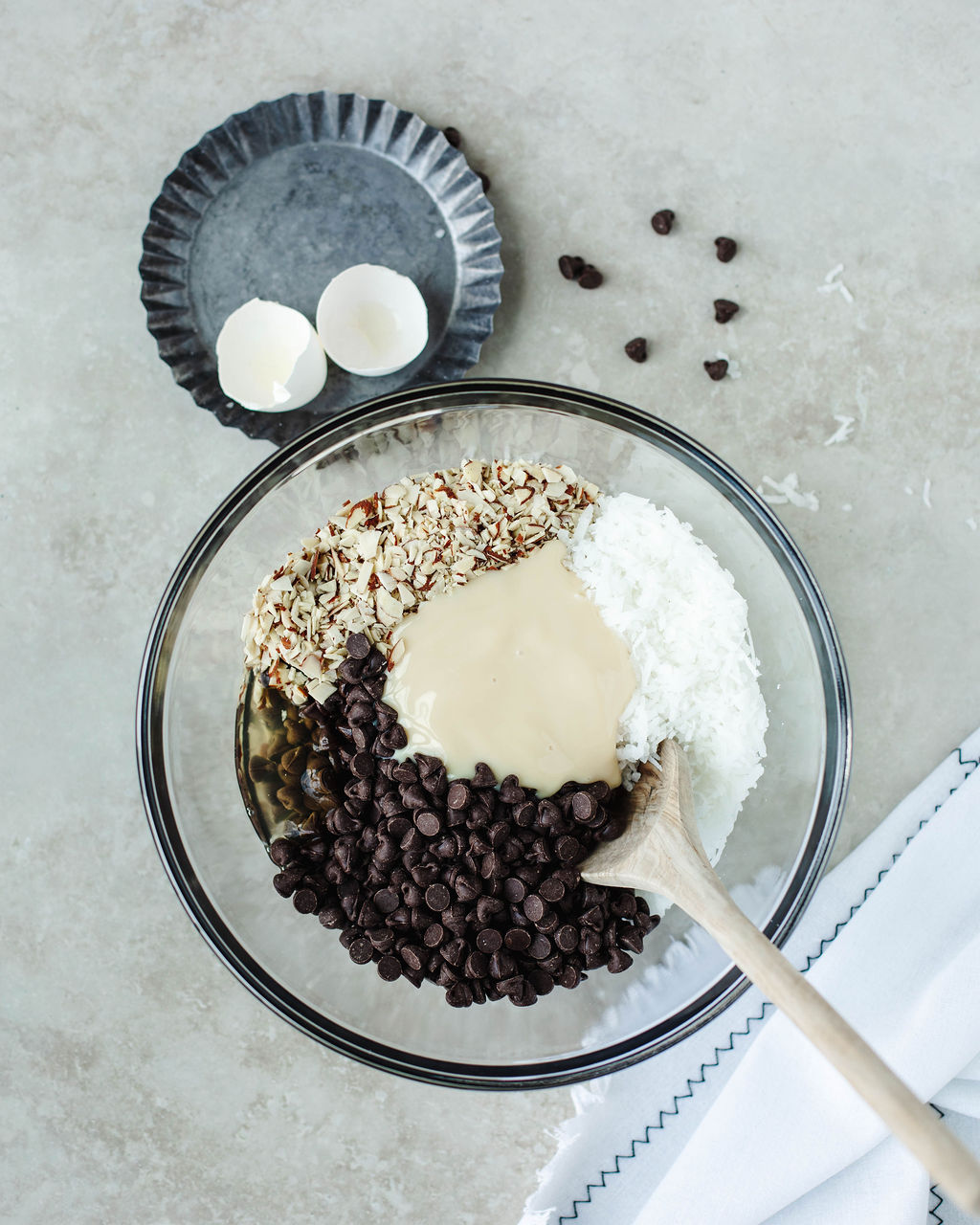 almond joy cookie ingredients combined in a bowl.