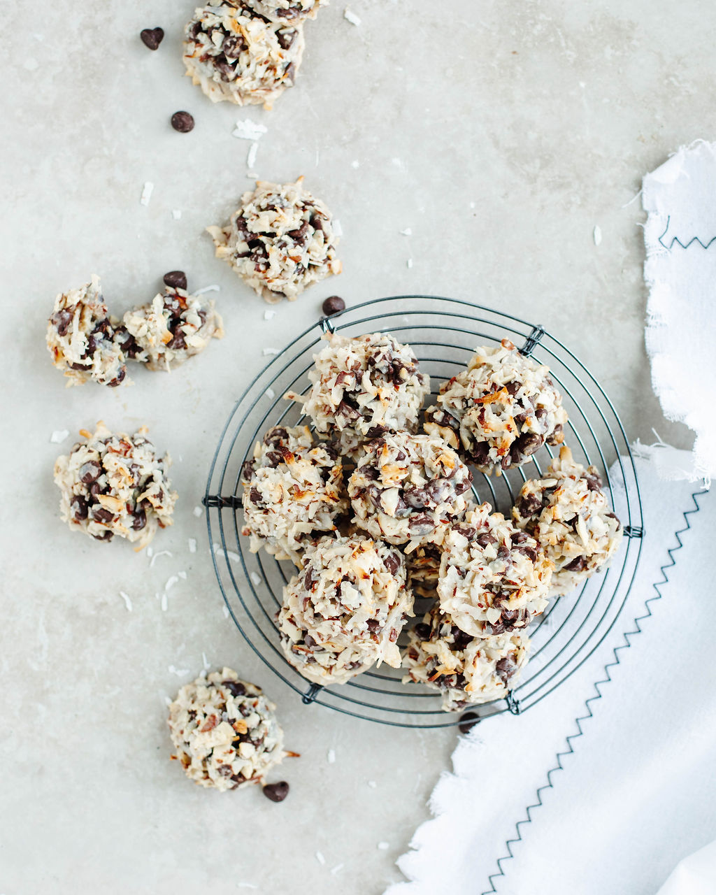 Almond Joy Cookies baked and placed on a black tray.