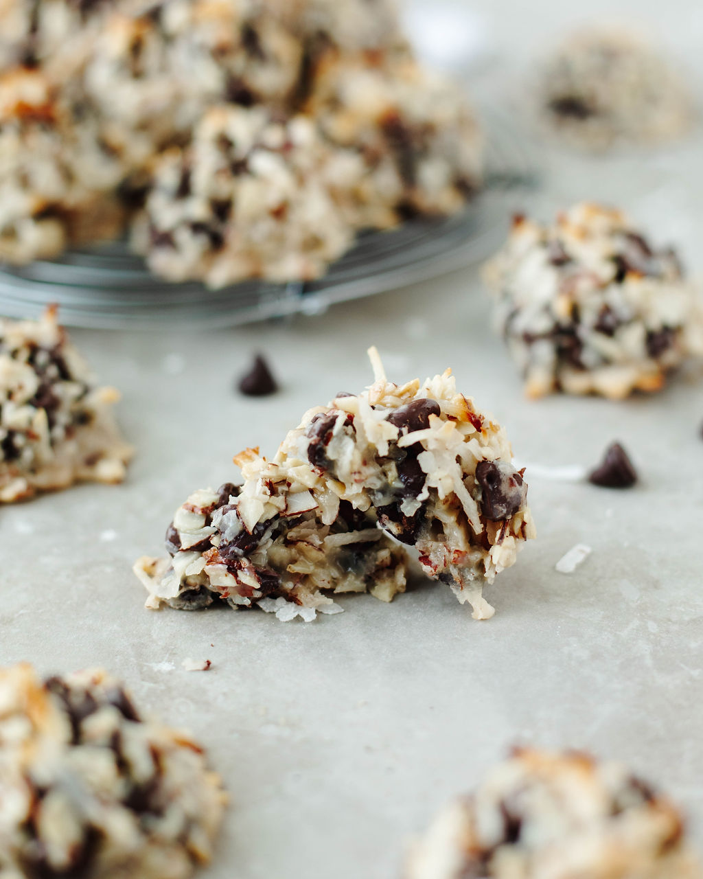 an almond joy cookie sliced in half to show texture and center.