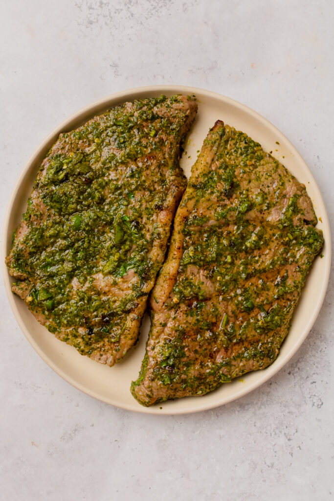 marinated grilled steak ready to slice and assemble into burritos.