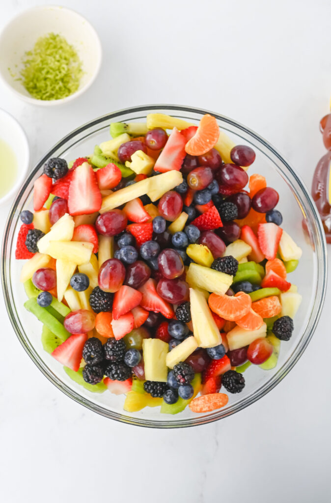 chopped fruit in a glass bowl.