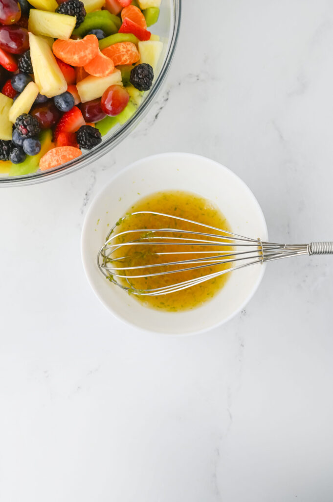 honey and lime juice combined in a small glass bowl.