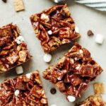 cut pieces of no bake smores bars using golden graham cereal.