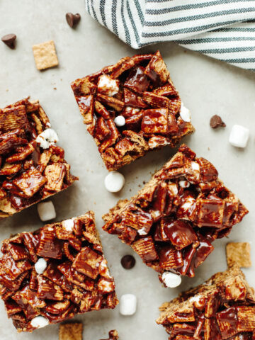 cut pieces of no bake smores bars using golden graham cereal.