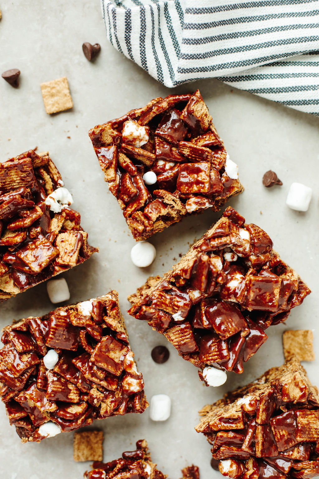 close up of gooey no bake s’mores dessert with cereal and chocolate chips.