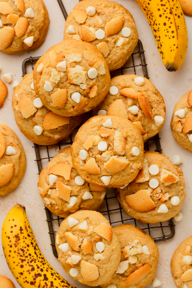 chewy banana pudding cookies on a cooling wire rack.