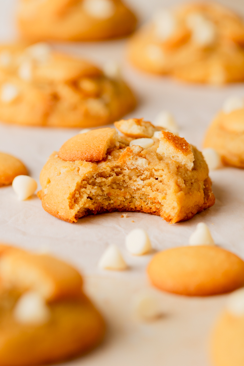 Close up of banana pudding cookie with white chocolate chips and vanilla wafers