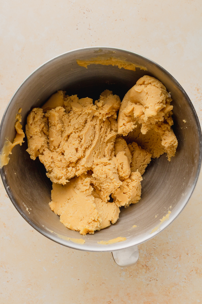cookie dough formed in a mixing bowl.