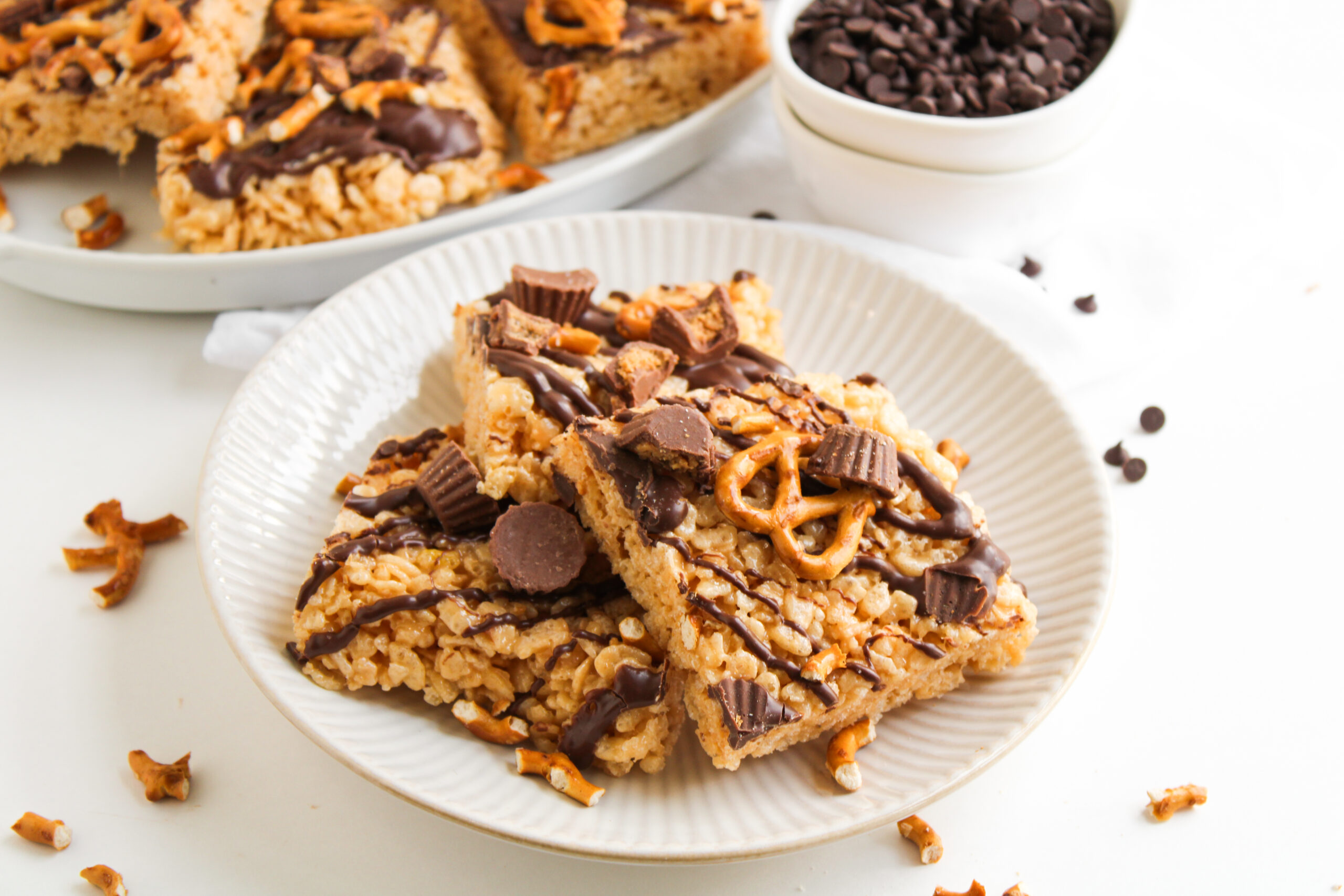 Easy chocolate peanut butter rice krispie treats stacked and ready to serve
