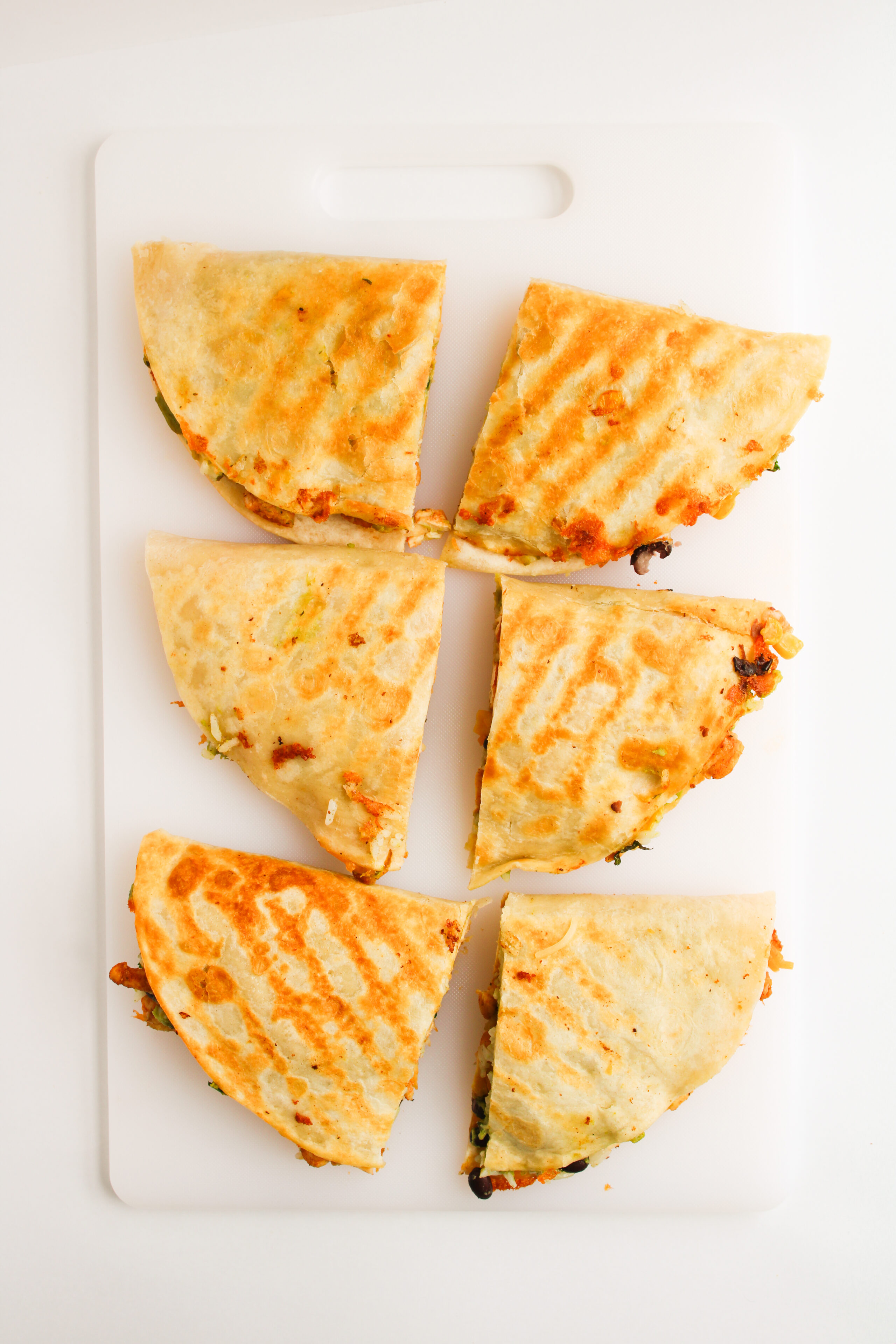 a quesadilla cut into smaller pieces and ready to serve.