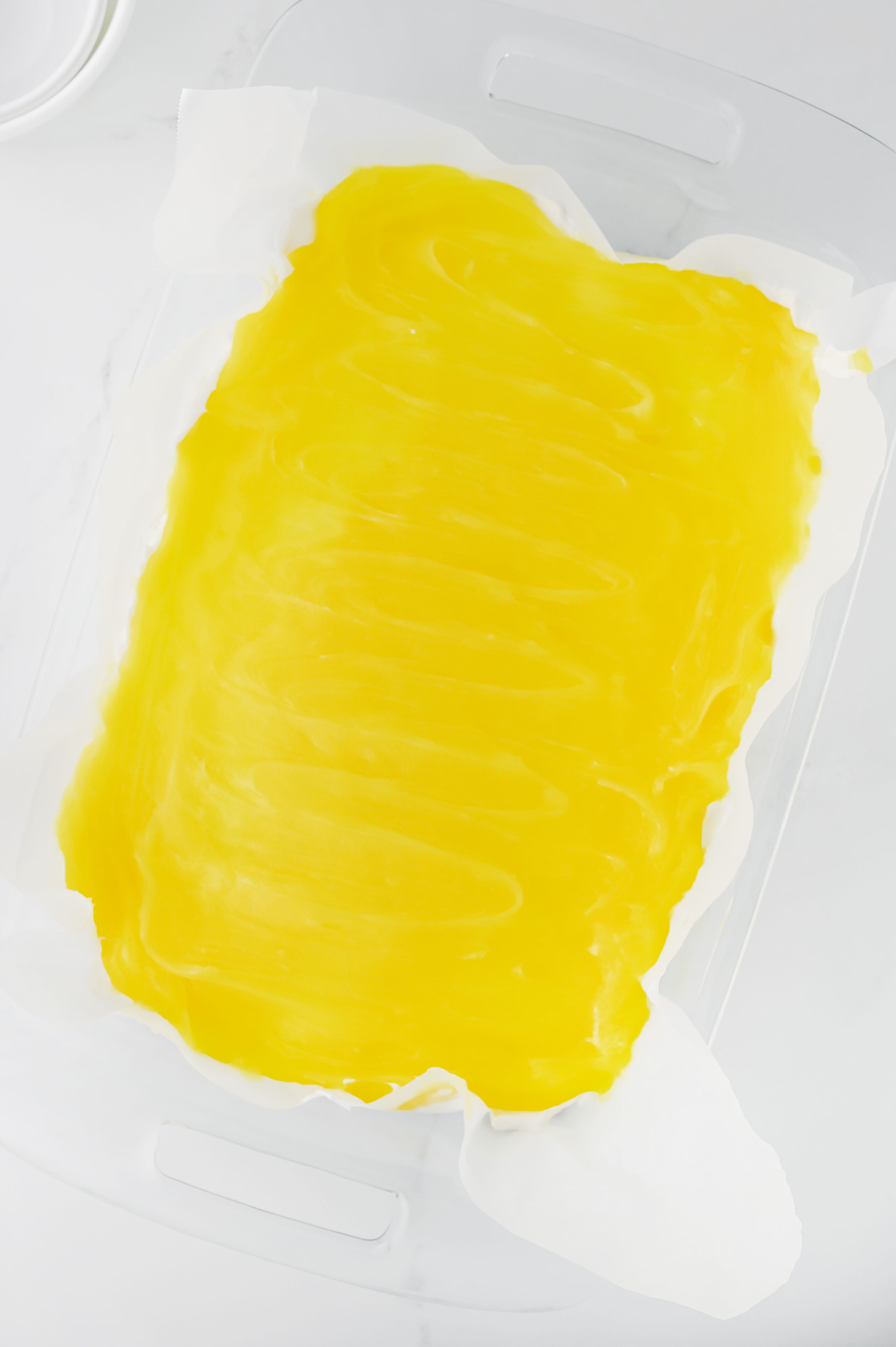 lemon pie filling spread on top of cream cheese mixture to set up into a layered dessert.