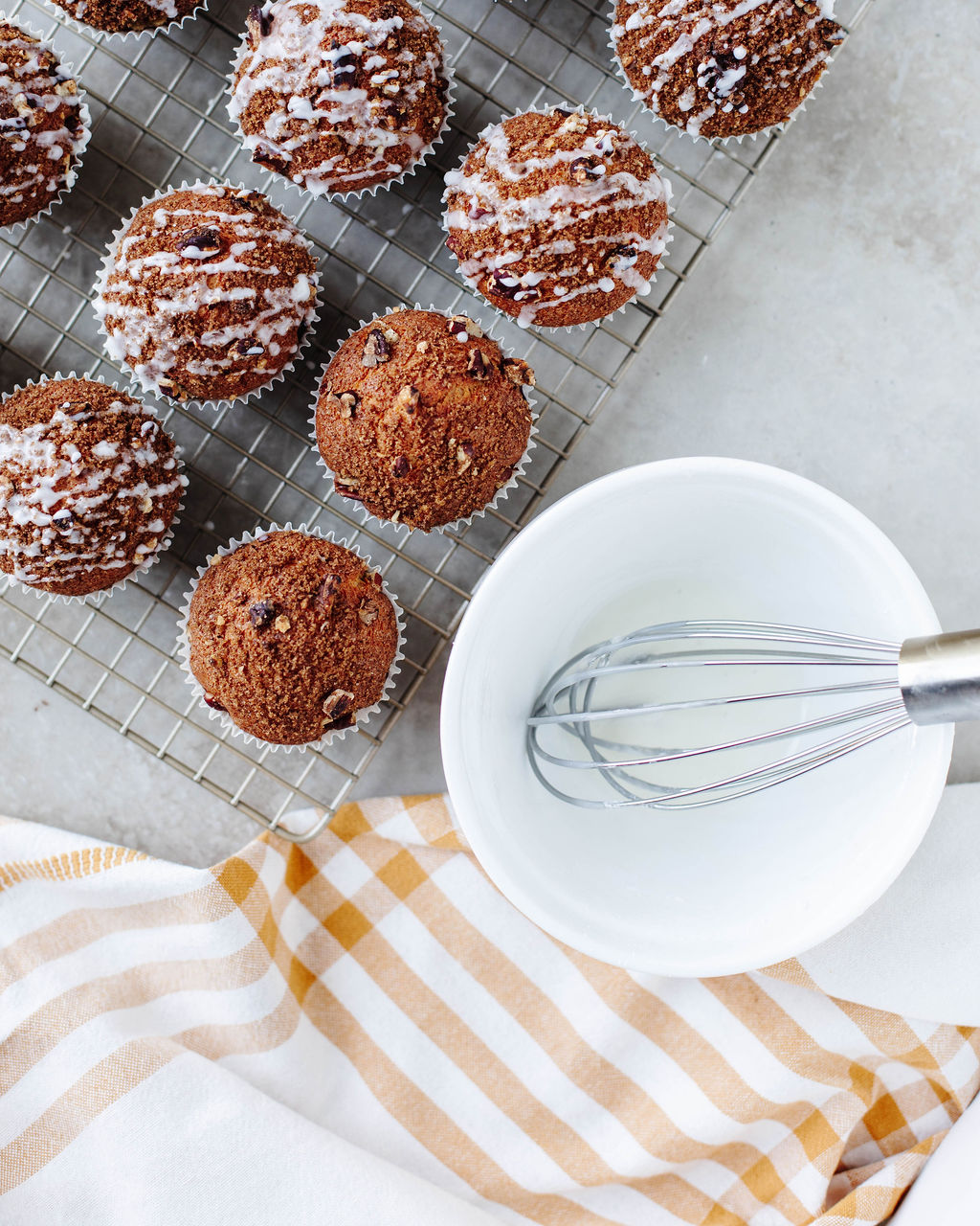 Cooling rack of freshly baked coffee cake muffins ready to serve.